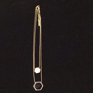 Metaphor double chain necklace gold tone.